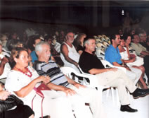 The Mayor of Polis watching the performance of CYCLOPS